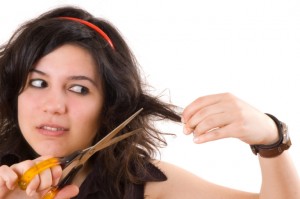 woman-cutting-own-hair